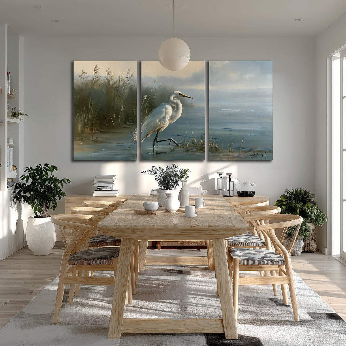 A white heron beside tall marsh grasses and still blue water 3 piece canvas wall art room and product view