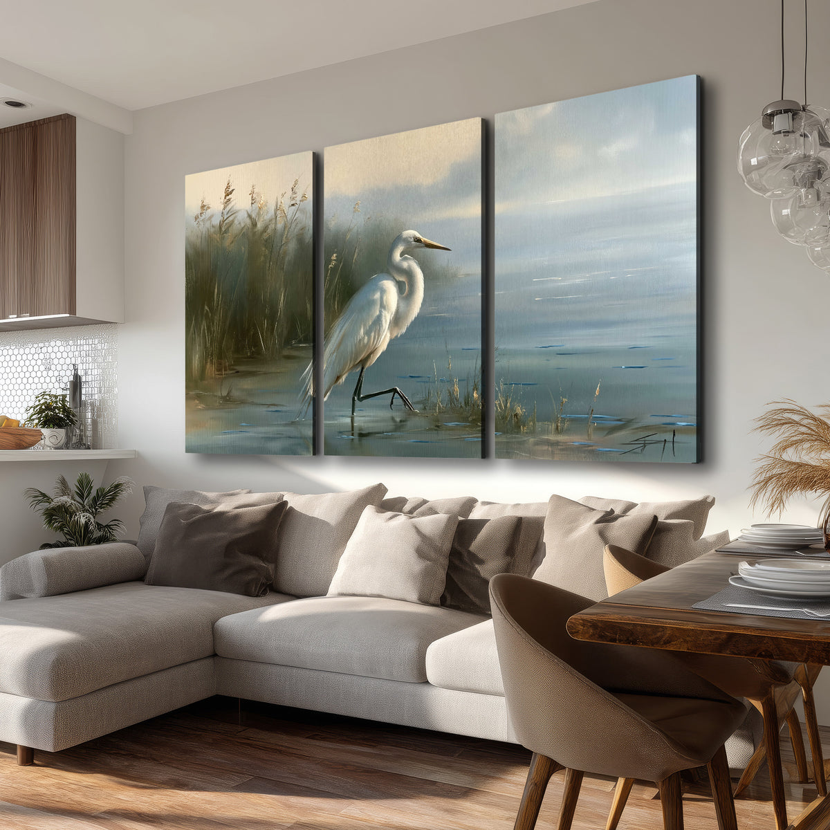 A white heron beside tall marsh grasses and still blue water 3 piece canvas wall art room and product view