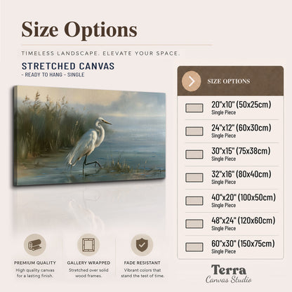 A white heron beside tall marsh grasses and still blue water single canvas wall art available dimensions
