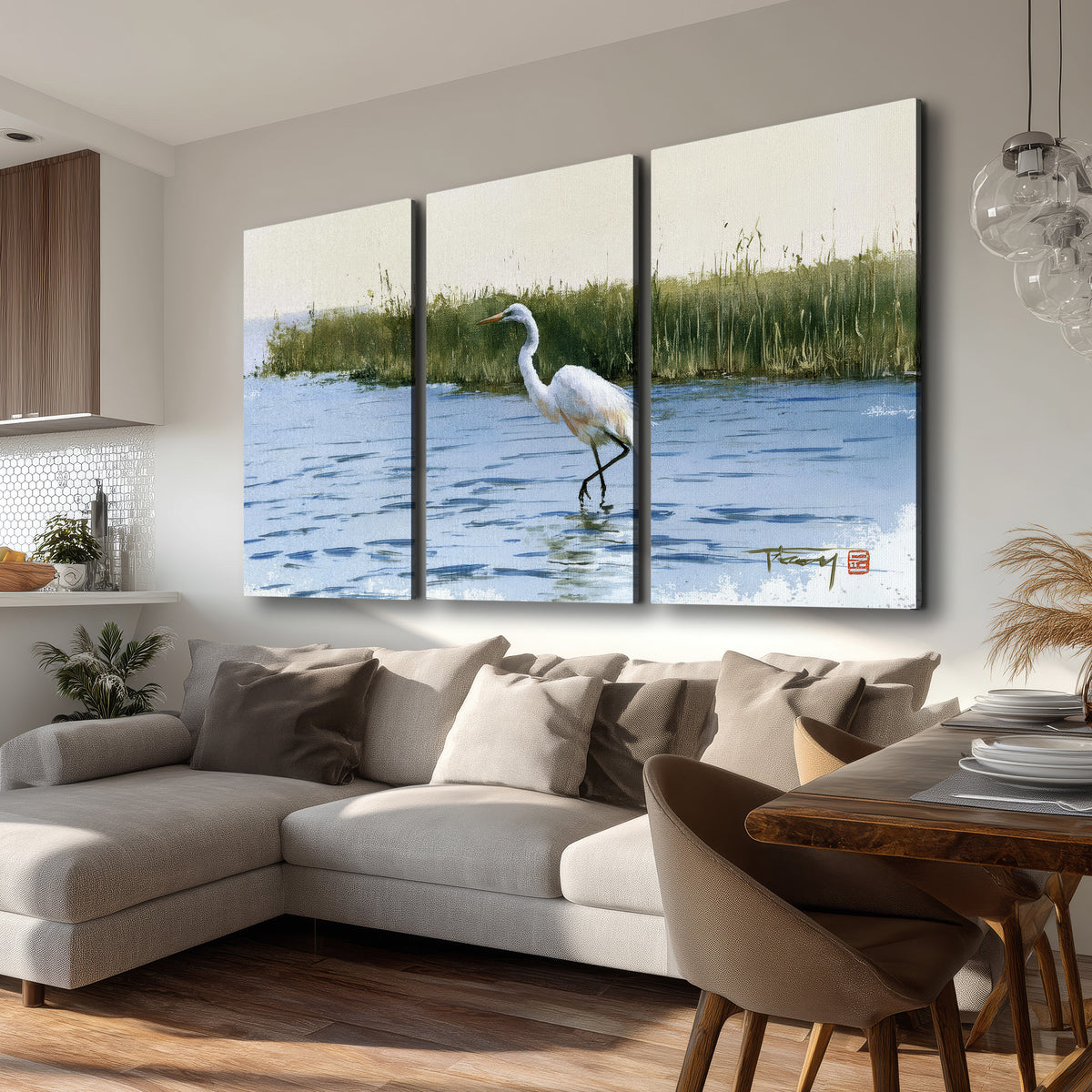 A white heron wading through bright blue water beside green reeds 3 piece canvas wall art room and product view