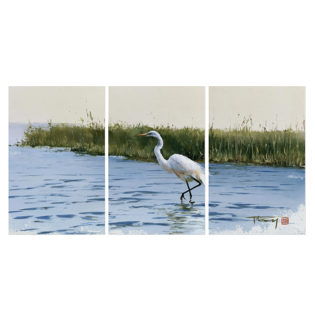 A white heron wading through bright blue water beside green reeds set of 3 poster prints viewed straight on