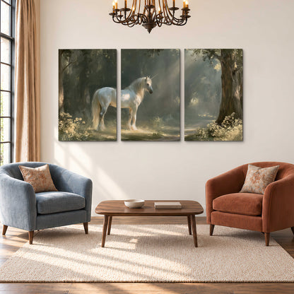 A white unicorn standing beneath arching trees in a softly lit woodland 3 piece canvas wall art styled in an interior