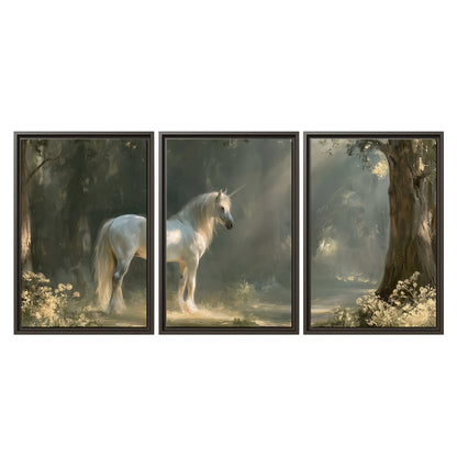 A white unicorn standing beneath arching trees in a softly lit woodland 3 piece framed canvas wall art viewed straight on