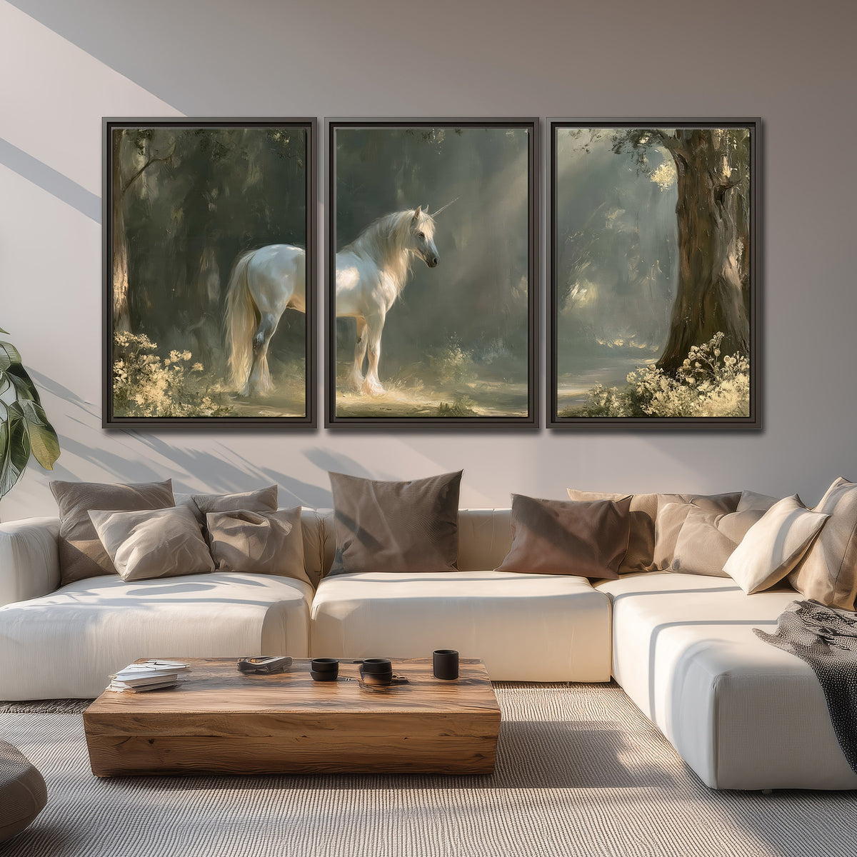 A white unicorn standing beneath arching trees in a softly lit woodland 3 piece framed canvas wall art displayed in a living room