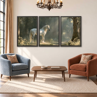 A white unicorn standing beneath arching trees in a softly lit woodland 3 piece framed canvas wall art styled in an interior
