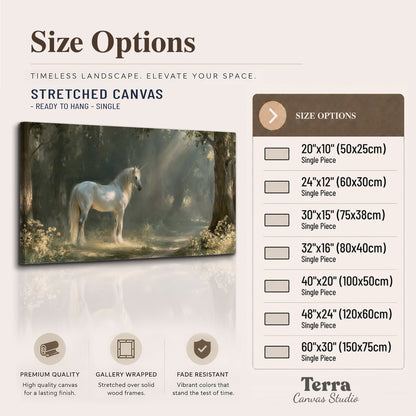 A white unicorn standing beneath arching trees in a softly lit woodland single canvas wall art available dimensions