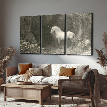 A pale unicorn surrounded by fine gray woodland branches and soft mist 3 piece canvas wall art displayed in a rustic living room