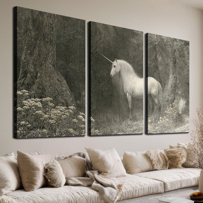 A pale unicorn surrounded by fine gray woodland branches and soft mist 3 piece canvas wall art room and product view