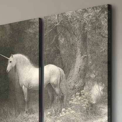 A pale unicorn surrounded by fine gray woodland branches and soft mist 3 piece canvas wall art room and product view