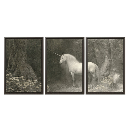 A pale unicorn surrounded by fine gray woodland branches and soft mist 3 piece framed canvas wall art viewed straight on