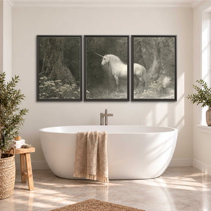 A pale unicorn surrounded by fine gray woodland branches and soft mist 3 piece framed canvas wall art styled in an interior