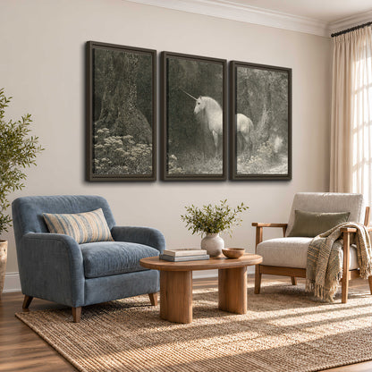 A pale unicorn surrounded by fine gray woodland branches and soft mist 3 piece framed canvas wall art styled in an interior