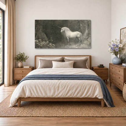 A pale unicorn surrounded by fine gray woodland branches and soft mist single canvas wall art styled in an interior