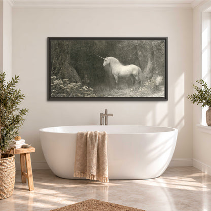 A pale unicorn surrounded by fine gray woodland branches and soft mist single framed canvas wall art styled in an interior
