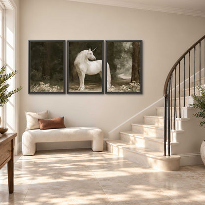 A white unicorn standing in a shadowed forest clearing among dark tree trunks 3 piece framed canvas wall art styled in an interior