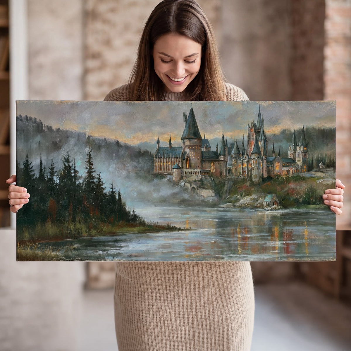 A storybook castle on a wooded riverbank beneath a cool misty sky single canvas wall art held in hands