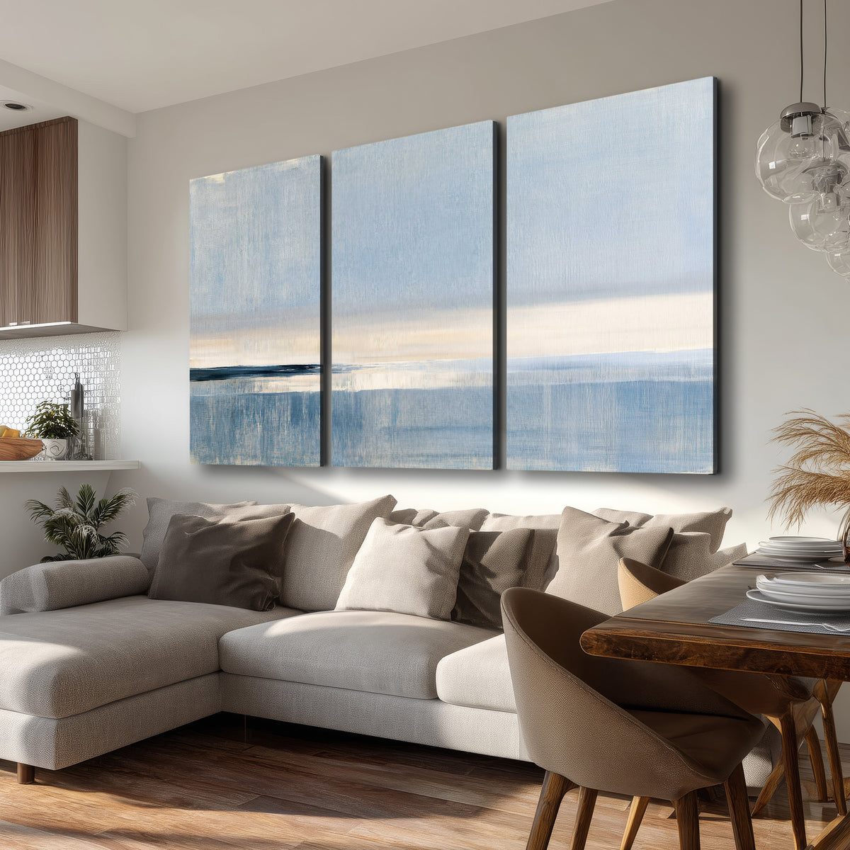A minimal blue seascape with a pale horizon and soft vertical reflections 3 piece canvas wall art room and product view