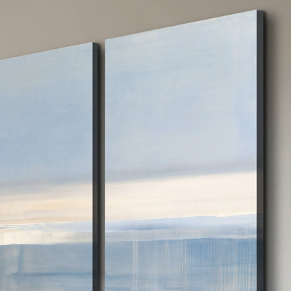 A minimal blue seascape with a pale horizon and soft vertical reflections 3 piece canvas wall art room and product view