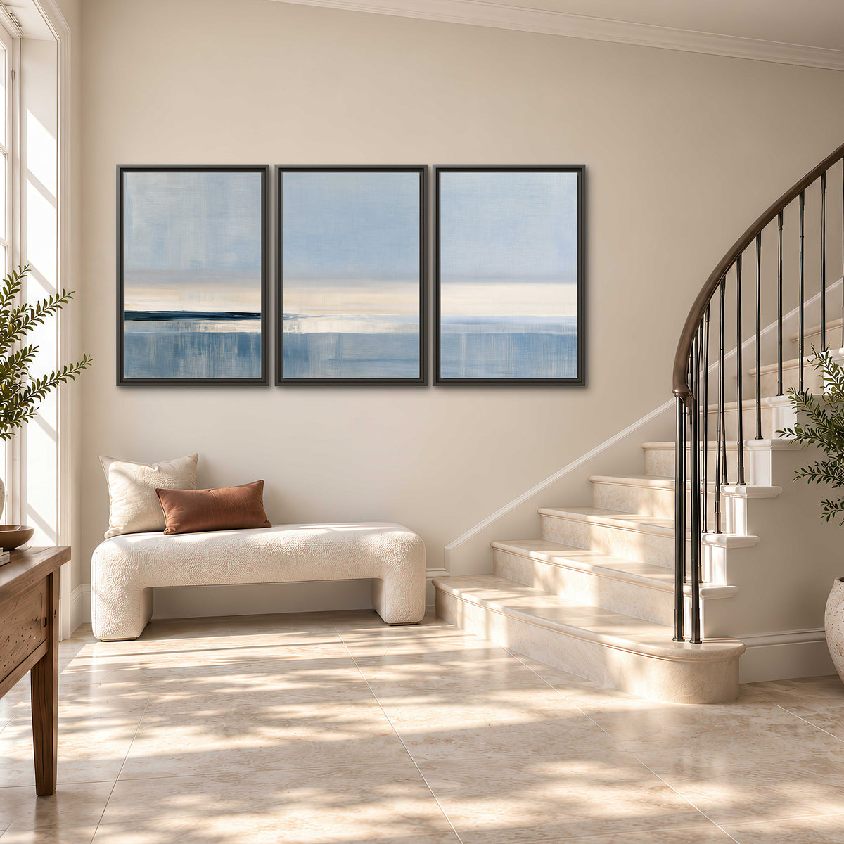 A minimal blue seascape with a pale horizon and soft vertical reflections 3 piece framed canvas wall art styled in an interior