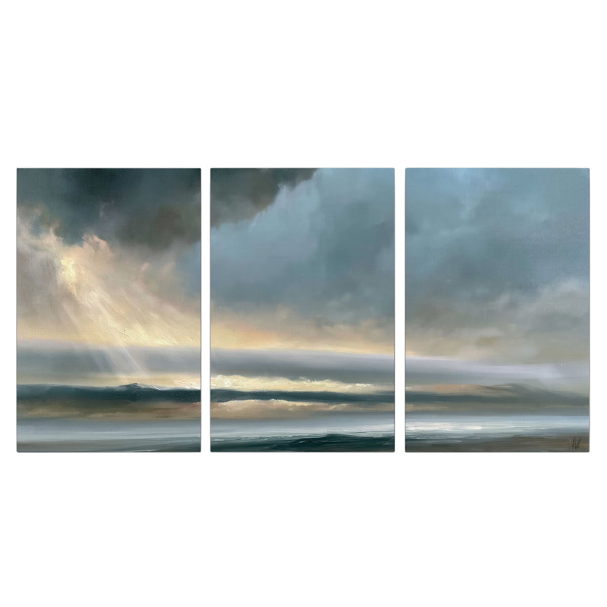 Dramatic blue-gray storm clouds breaking over a pale strip of ocean light 3 piece canvas wall art viewed straight on