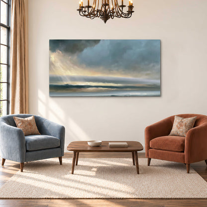 Dramatic blue-gray storm clouds breaking over a pale strip of ocean light single canvas wall art styled in an interior