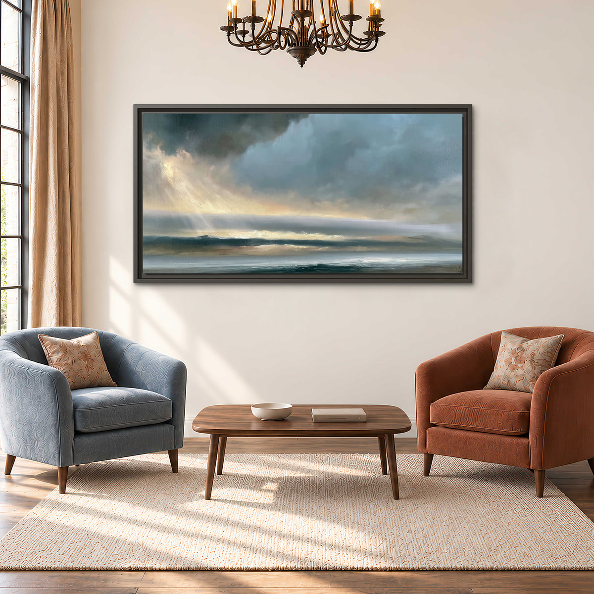 Dramatic blue-gray storm clouds breaking over a pale strip of ocean light single framed canvas wall art styled in an interior