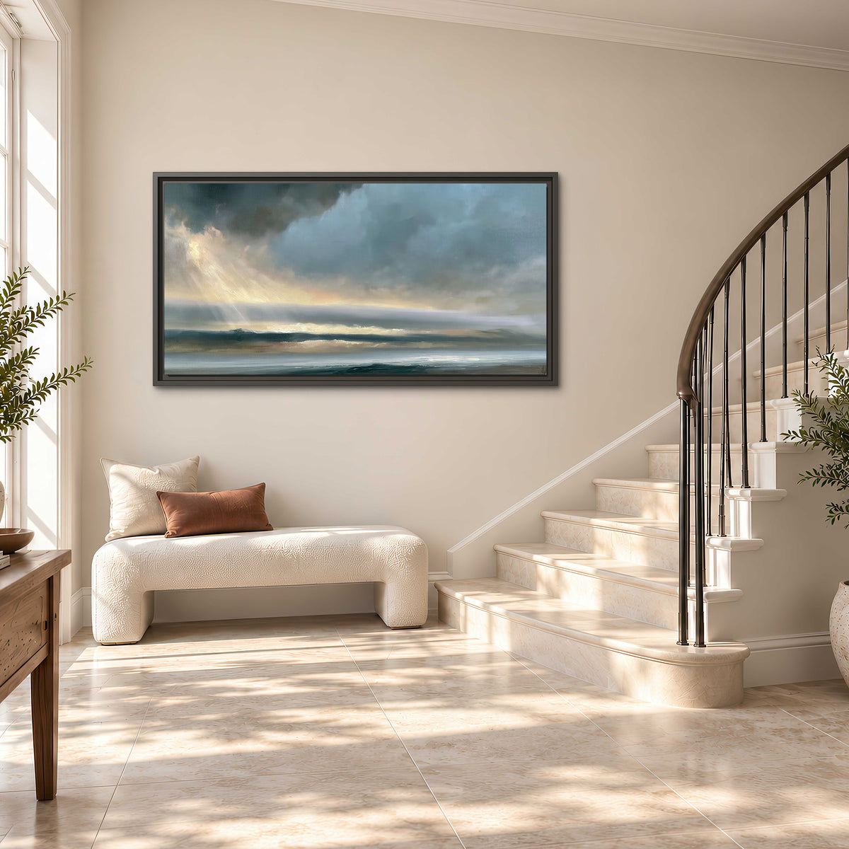 Dramatic blue-gray storm clouds breaking over a pale strip of ocean light single framed canvas wall art styled in an interior