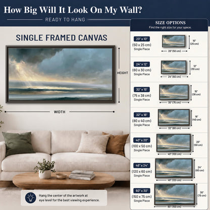 Dramatic blue-gray storm clouds breaking over a pale strip of ocean light single framed canvas wall art size guide above a sofa; room view is illustrative