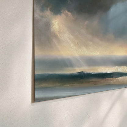 Dramatic blue-gray storm clouds breaking over a pale strip of ocean light set of 3 poster prints material and edge close up