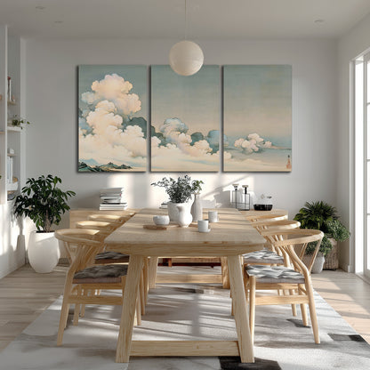 Soft cream clouds gathered low in a muted blue-green sky 3 piece canvas wall art room and product view