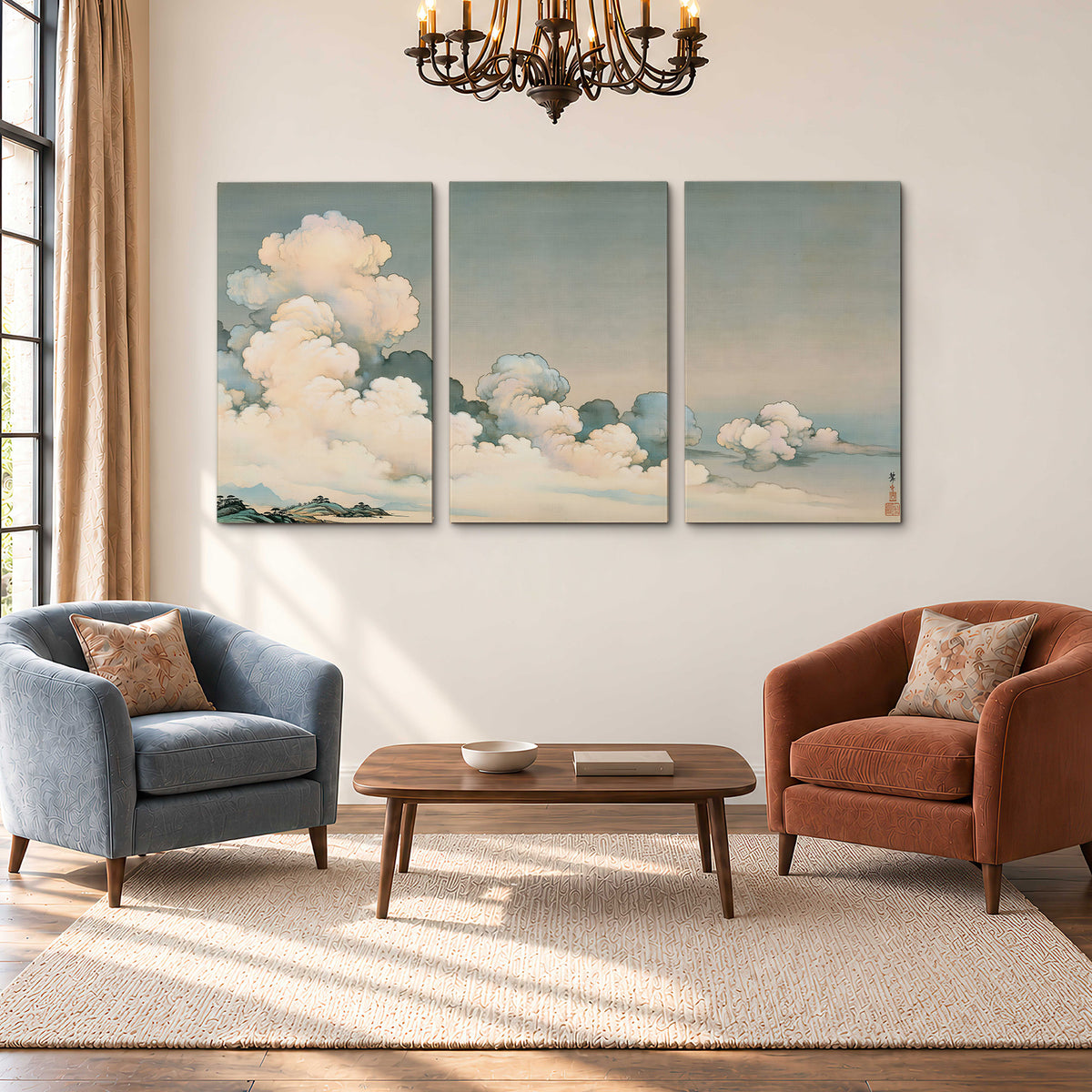 Soft cream clouds gathered low in a muted blue-green sky 3 piece canvas wall art styled in an interior