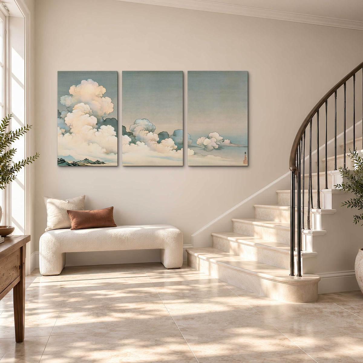 Soft cream clouds gathered low in a muted blue-green sky 3 piece canvas wall art styled in an interior