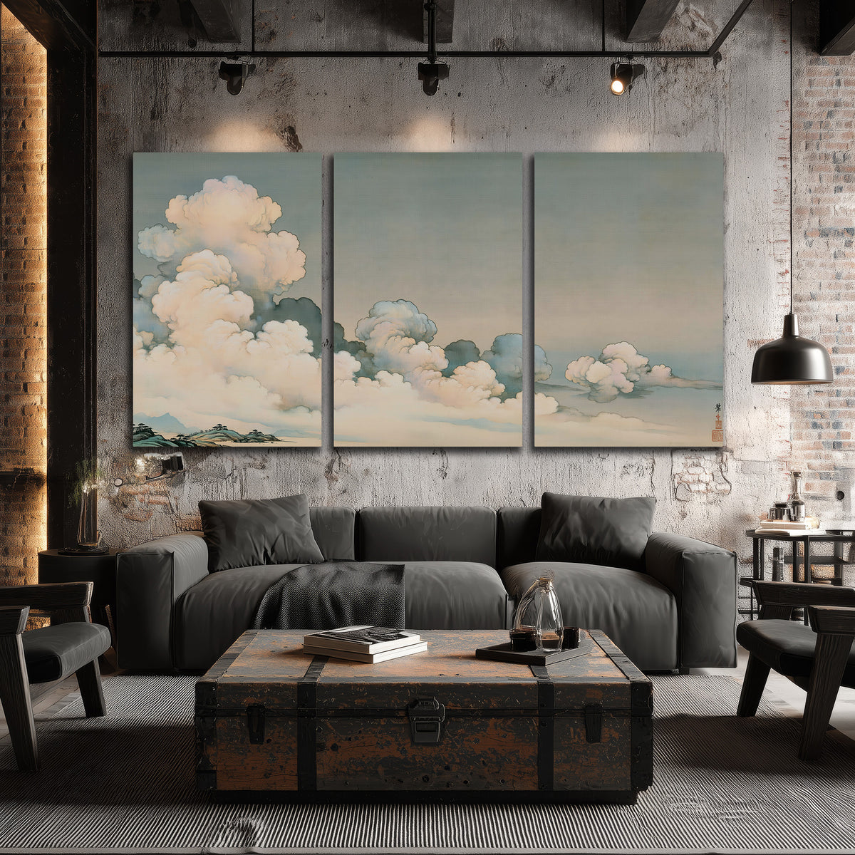 Soft cream clouds gathered low in a muted blue-green sky 3 piece canvas wall art displayed in a industrial room