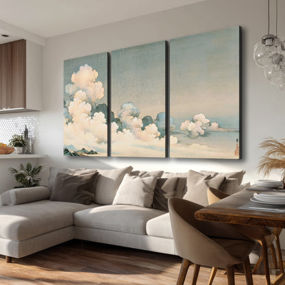 Soft cream clouds gathered low in a muted blue-green sky 3 piece canvas wall art room and product view