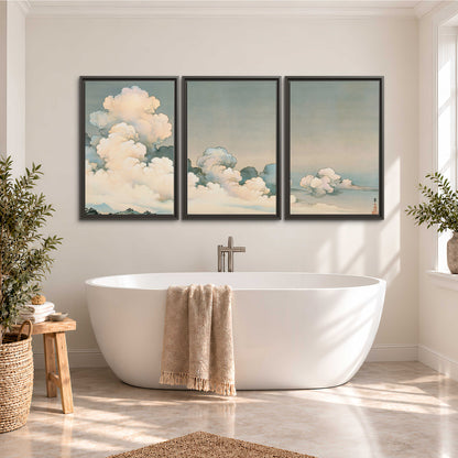 Soft cream clouds gathered low in a muted blue-green sky 3 piece framed canvas wall art styled in an interior