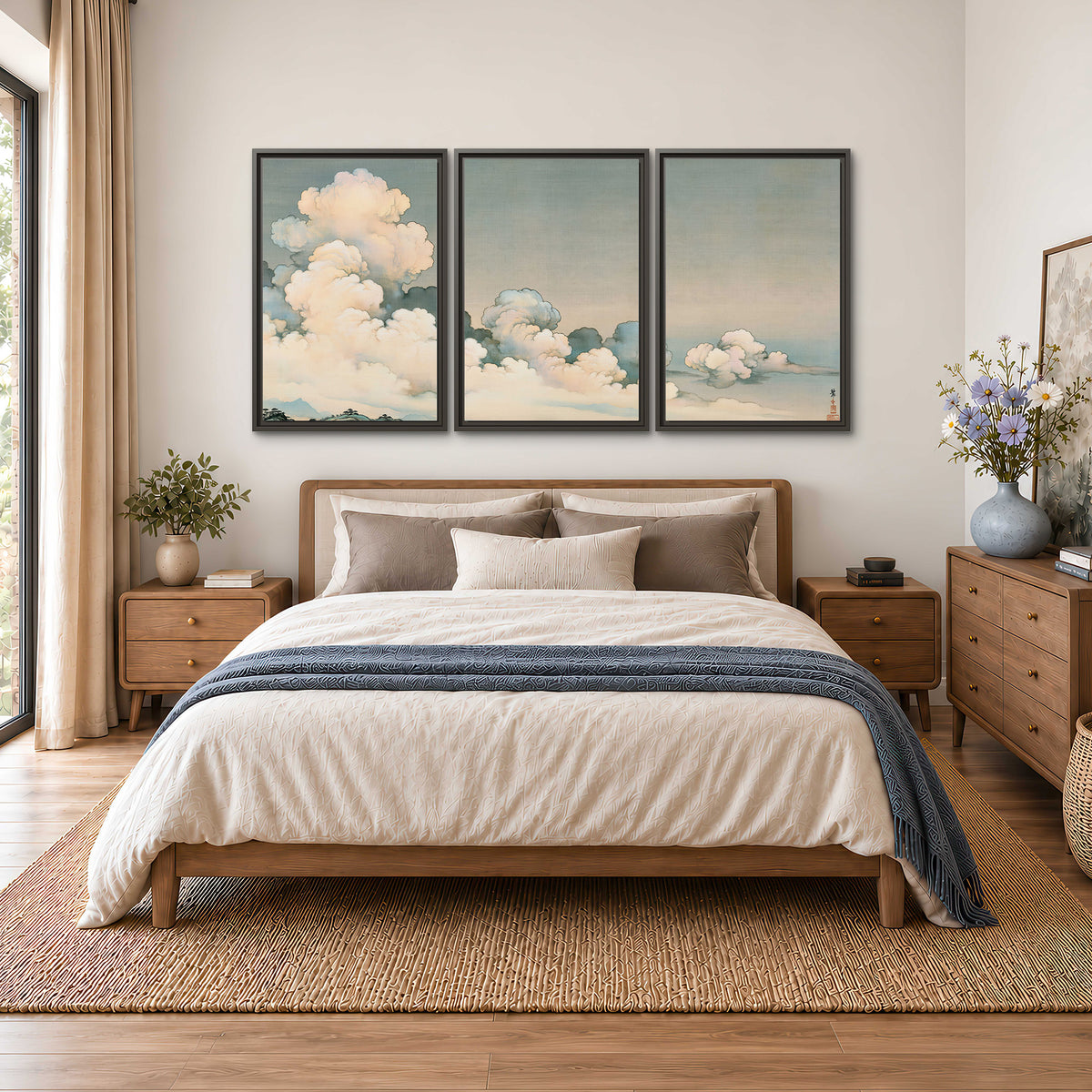 Soft cream clouds gathered low in a muted blue-green sky 3 piece framed canvas wall art styled in an interior