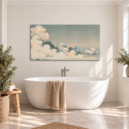Soft cream clouds gathered low in a muted blue-green sky single canvas wall art styled in an interior