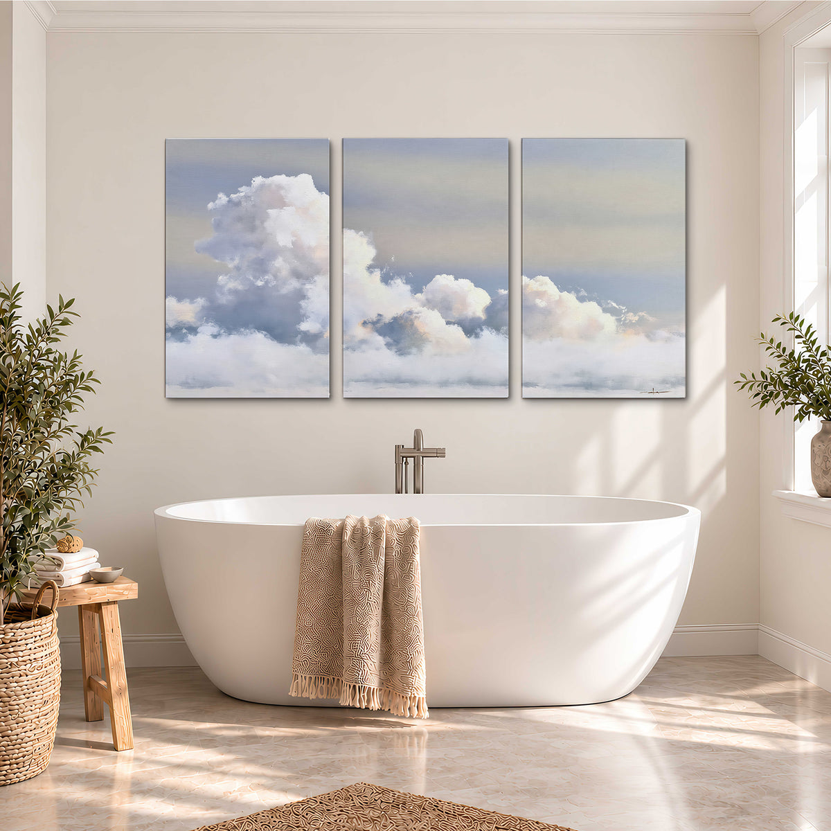 Large white clouds rising through a pale blue sky with gentle warm highlights 3 piece canvas wall art styled in an interior