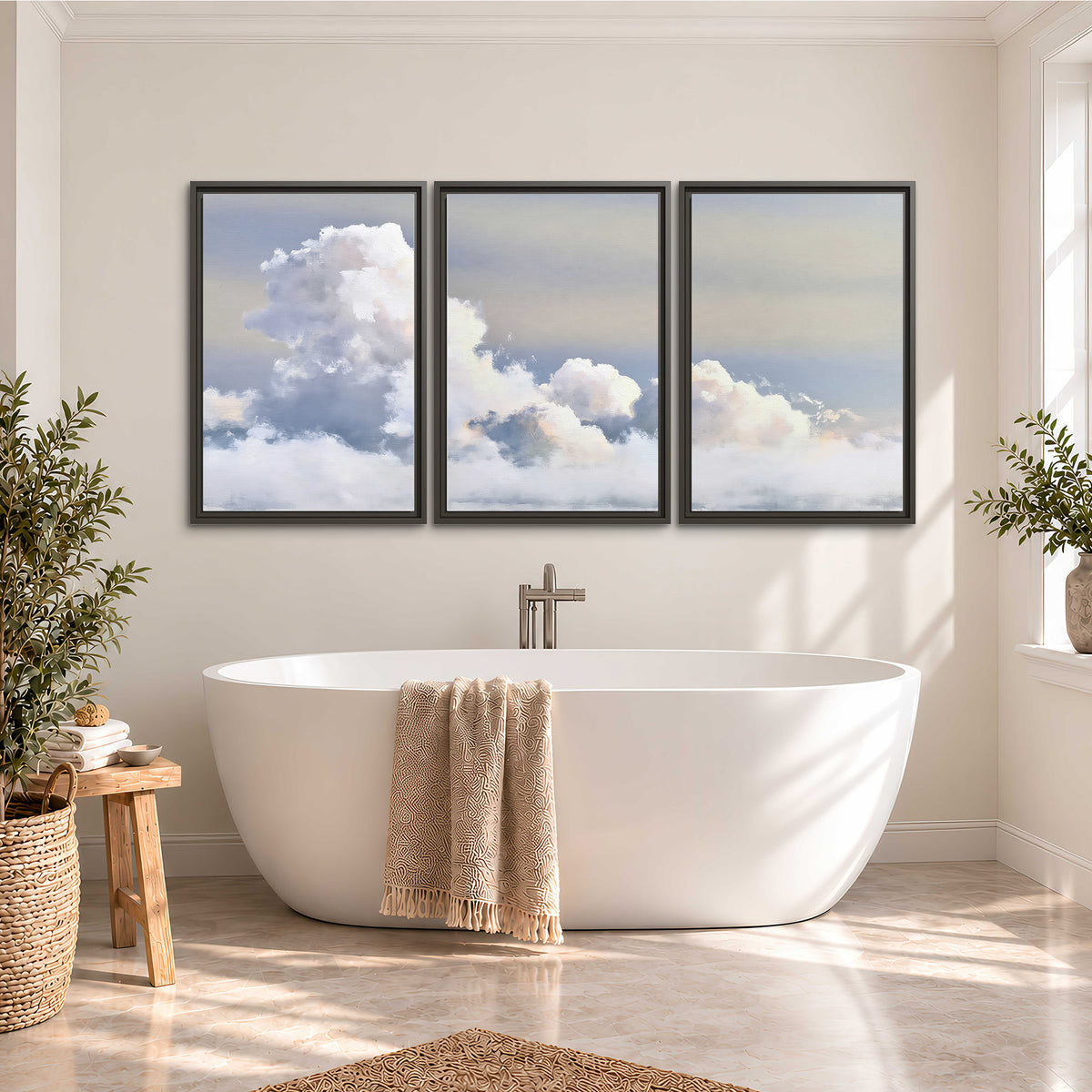 Large white clouds rising through a pale blue sky with gentle warm highlights 3 piece framed canvas wall art styled in an interior