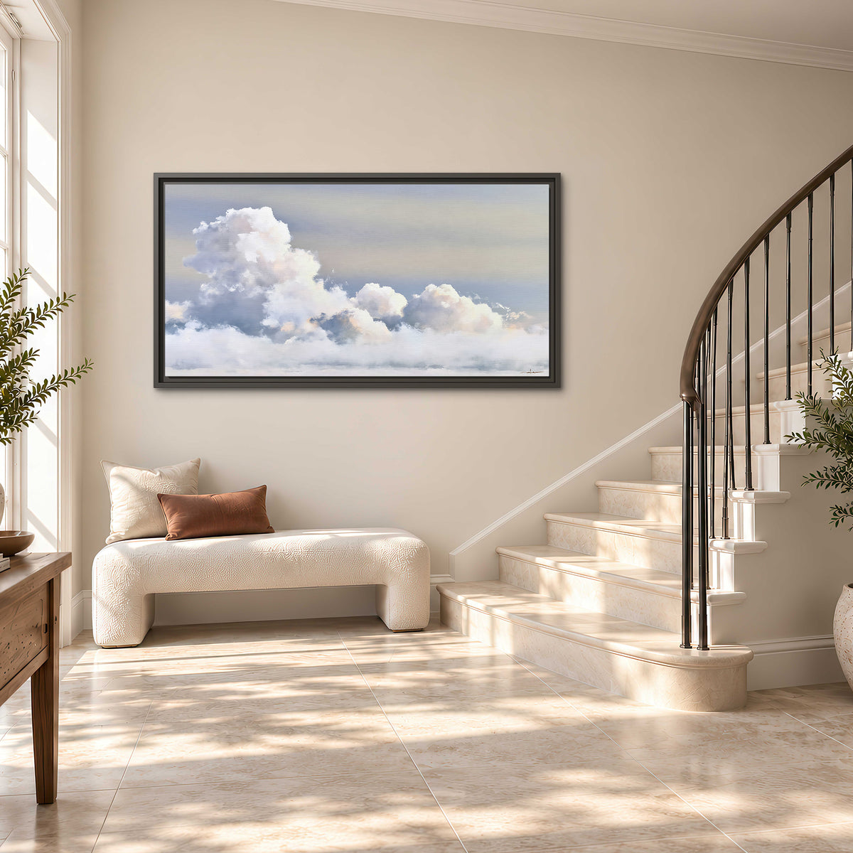 Large white clouds rising through a pale blue sky with gentle warm highlights single framed canvas wall art styled in an interior