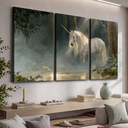 A white unicorn standing near rocks and a quiet stream in a green woodland 3 piece canvas wall art displayed in a console