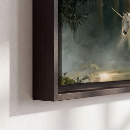 A white unicorn standing near rocks and a quiet stream in a green woodland 3 piece framed canvas wall art material and edge close up