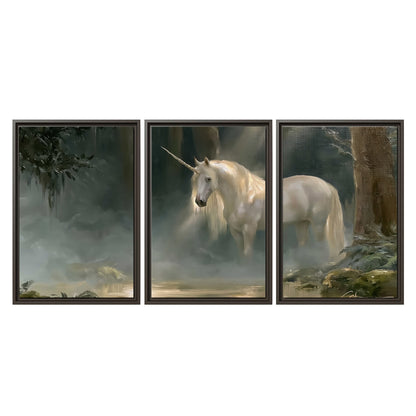 A white unicorn standing near rocks and a quiet stream in a green woodland 3 piece framed canvas wall art viewed straight on