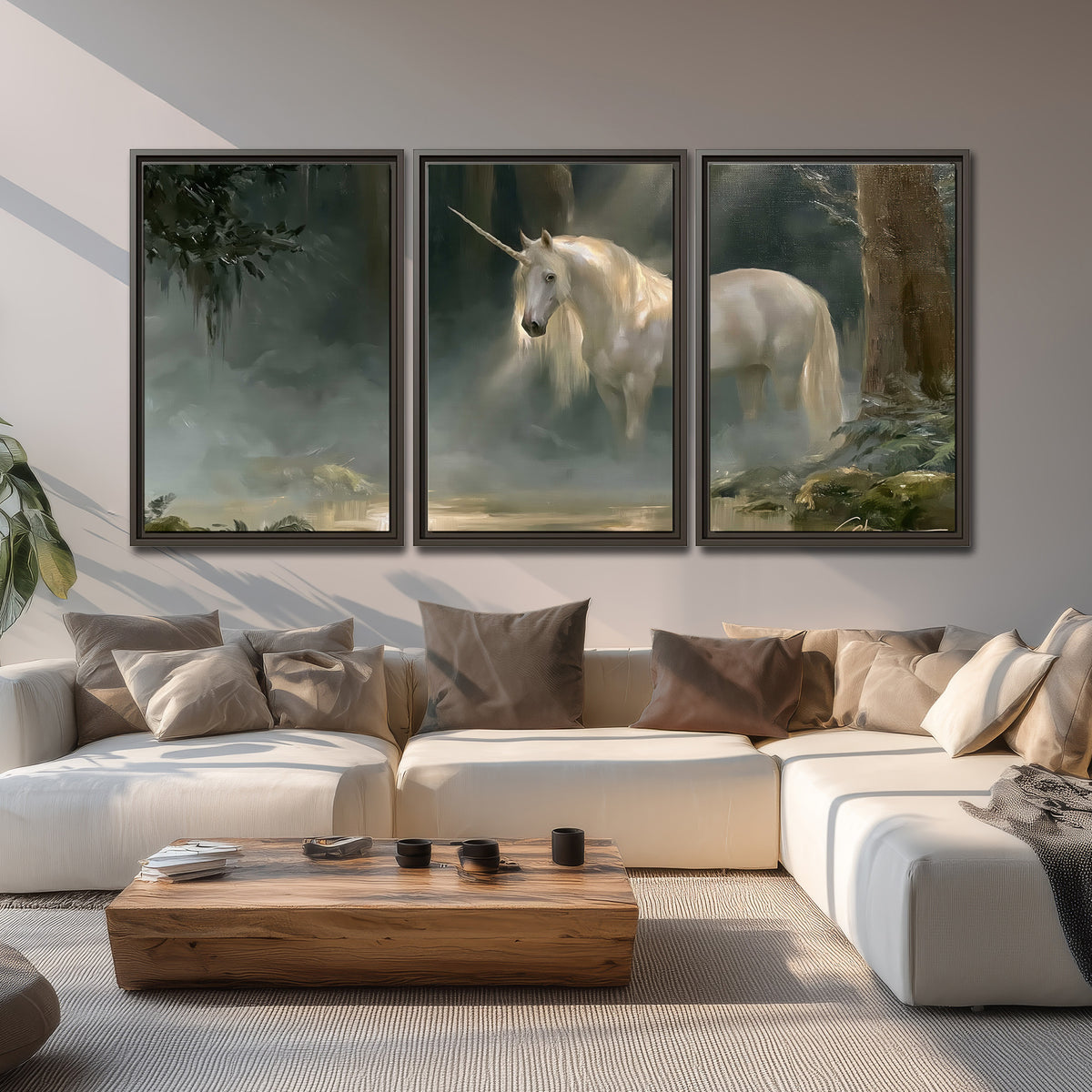 A white unicorn standing near rocks and a quiet stream in a green woodland 3 piece framed canvas wall art displayed in a living room