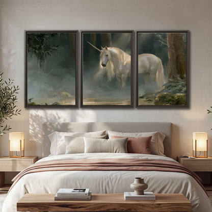 A white unicorn standing near rocks and a quiet stream in a green woodland 3 piece framed canvas wall art displayed in a bedroom