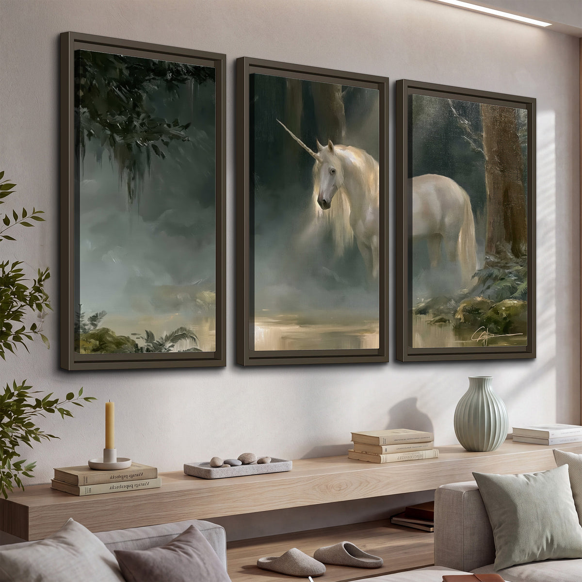 A white unicorn standing near rocks and a quiet stream in a green woodland 3 piece framed canvas wall art displayed in a console