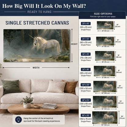 A white unicorn standing near rocks and a quiet stream in a green woodland single canvas wall art size guide above a sofa; room view is illustrative