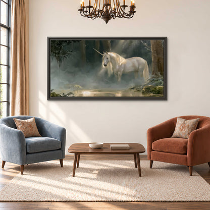 A white unicorn standing near rocks and a quiet stream in a green woodland single framed canvas wall art styled in an interior