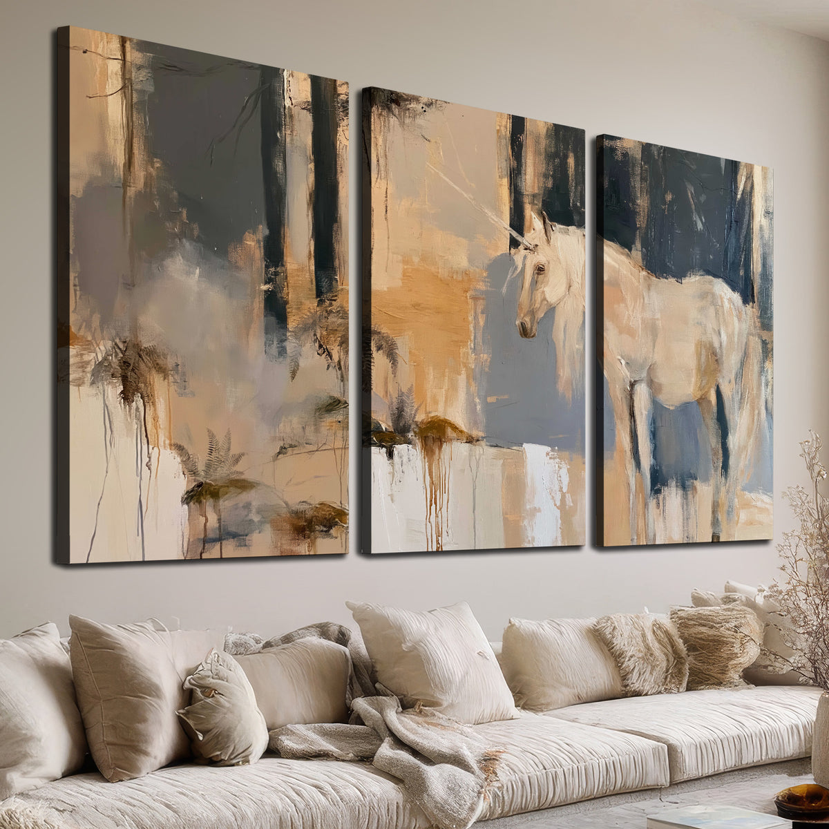 A pale unicorn emerging from loose vertical strokes of blue, ochre and cream 3 piece canvas wall art room and product view