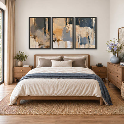 A pale unicorn emerging from loose vertical strokes of blue, ochre and cream 3 piece framed canvas wall art styled in an interior
